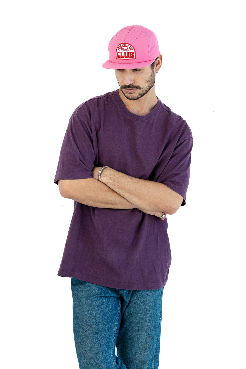 Bobby Lovejoy Pink cap worn by male model, posing