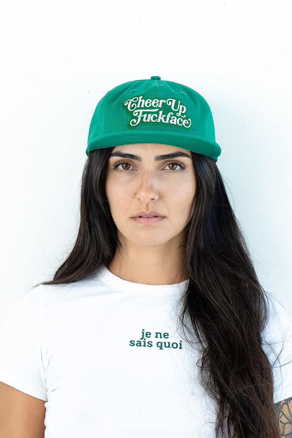 Bobby Lovejoy Green cap worn by female model, front head shot