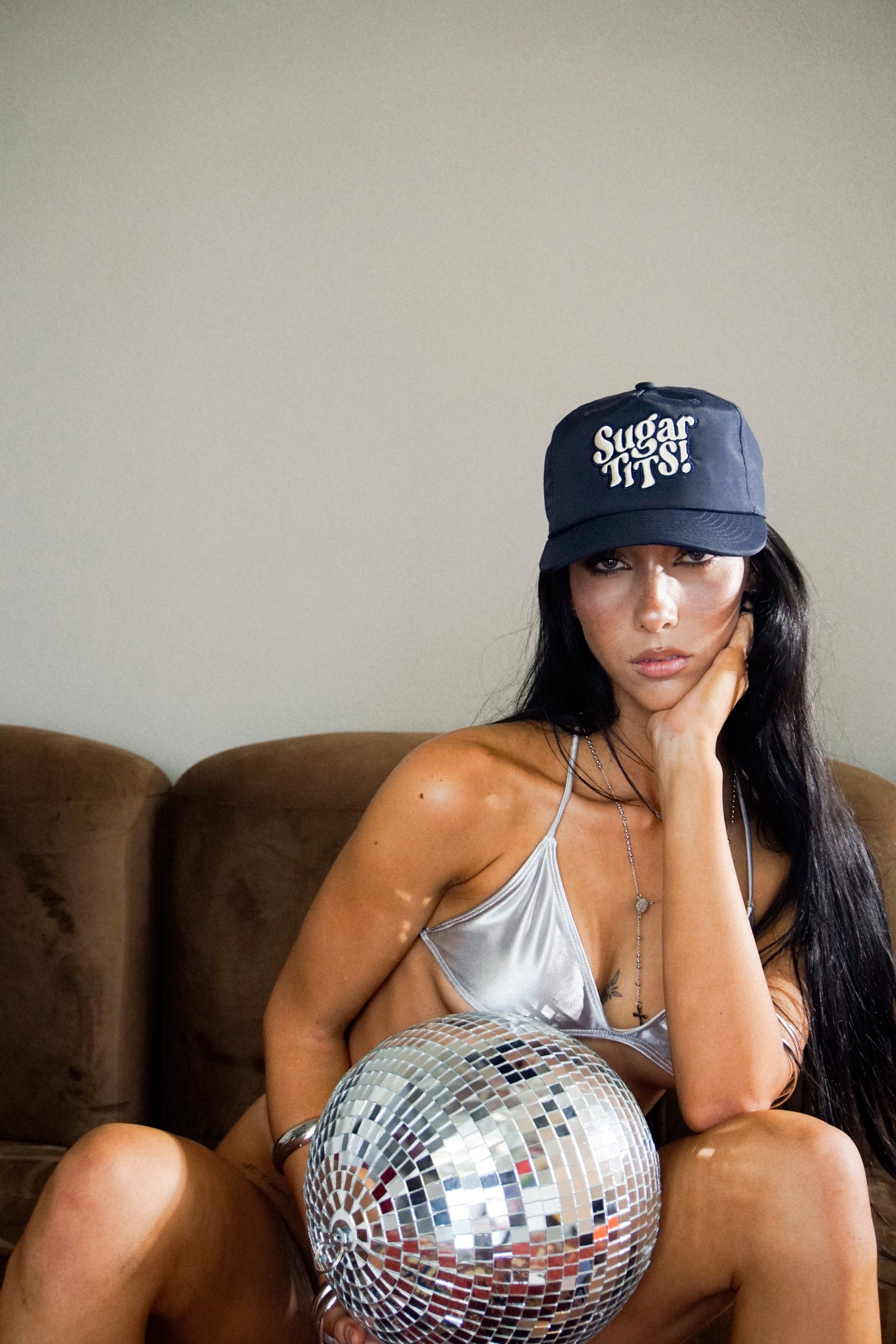 Bobby Lovejoy Navy cap worn by female model, posing